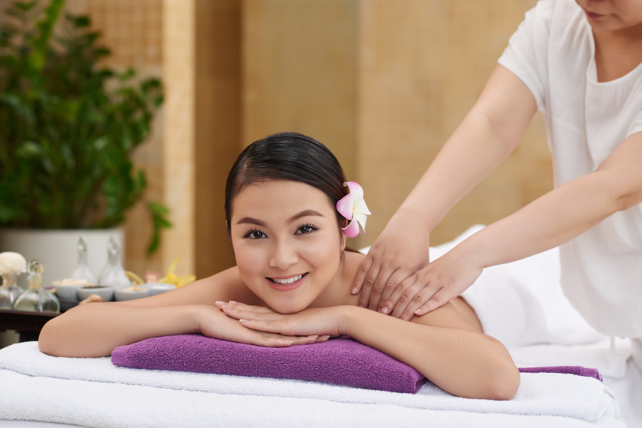 Woman getting a Thai massage